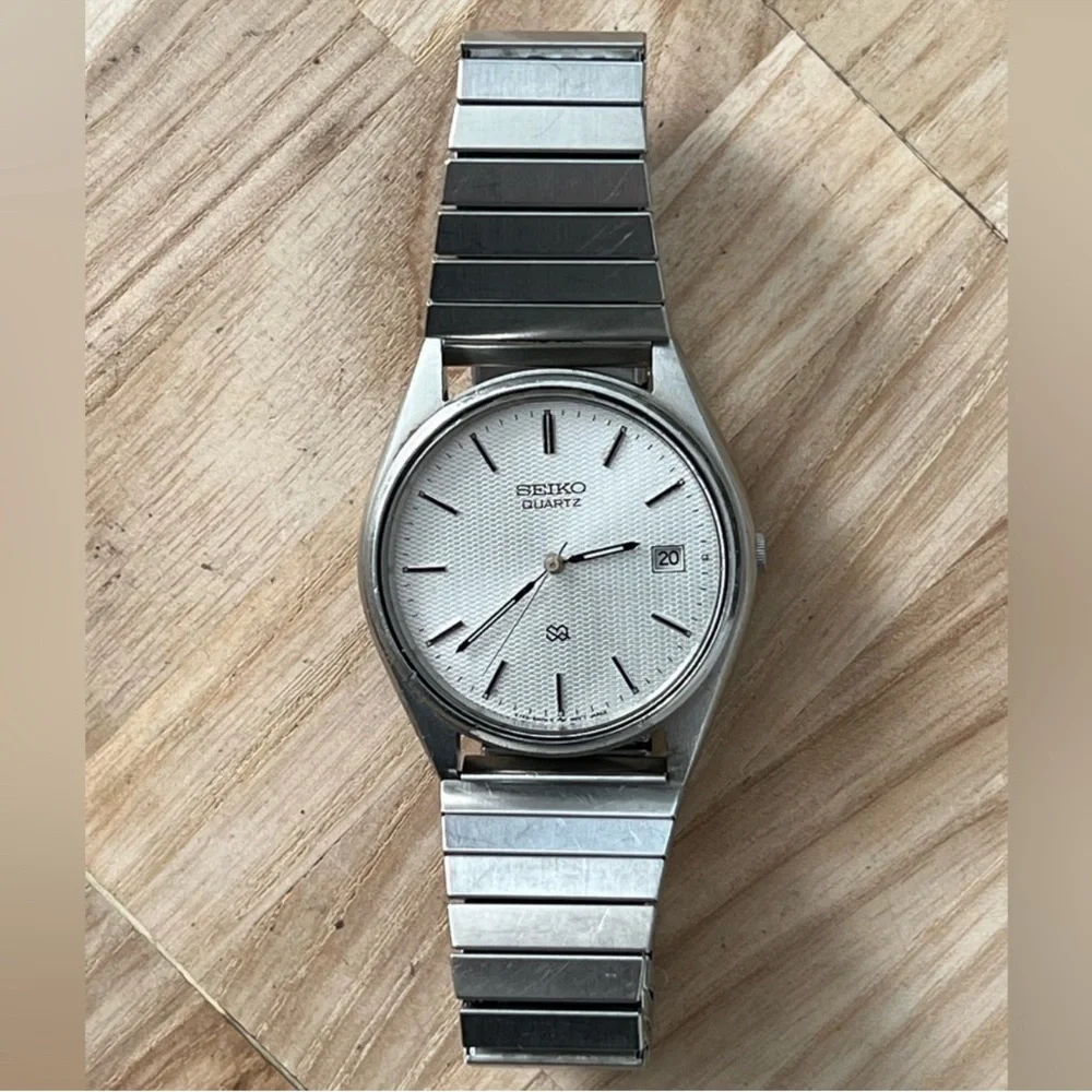 Seiko SQ Men's Watch Vintage Stainless Dial Stretch Bracelet Date Windows